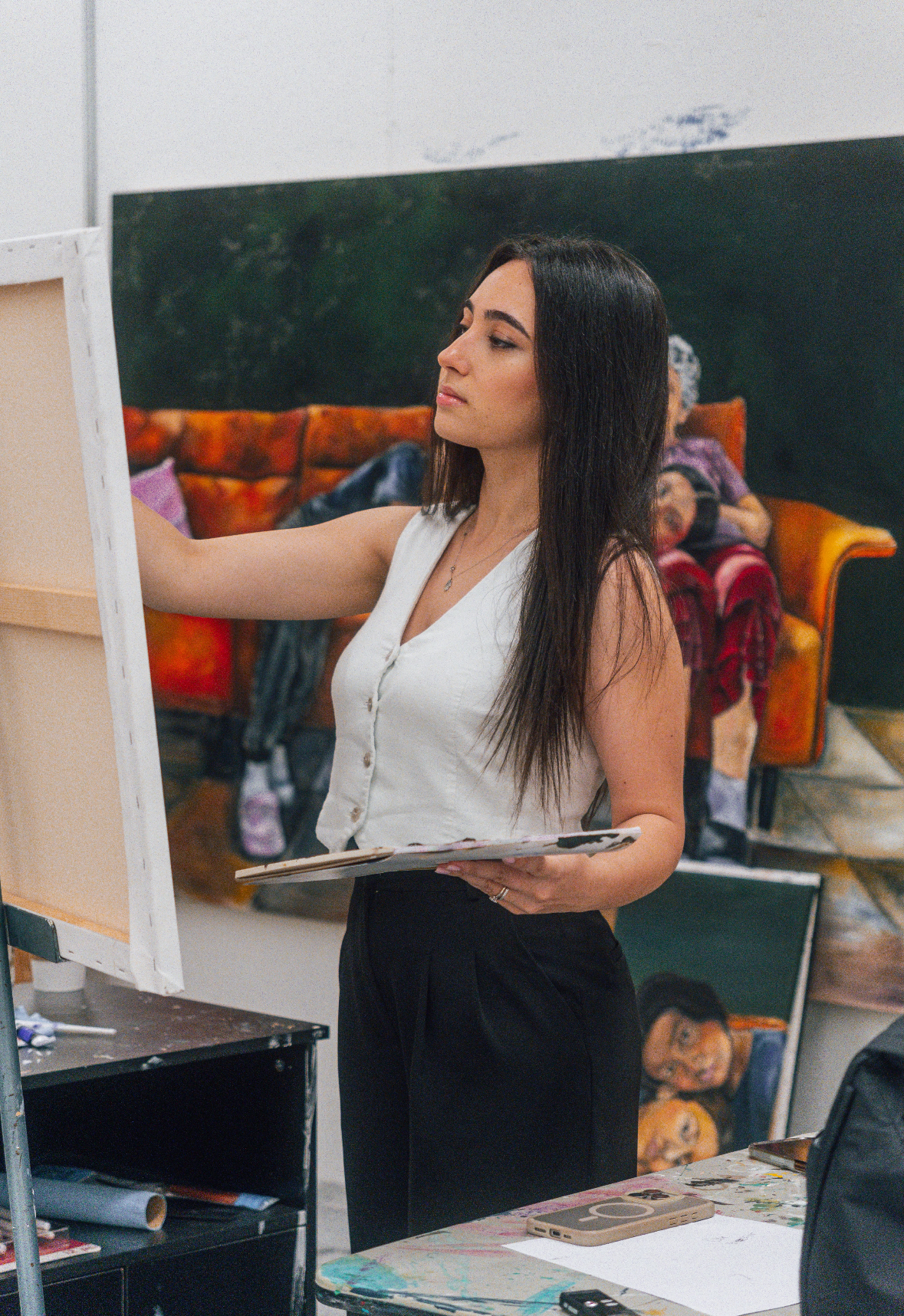 Artist working at an easel